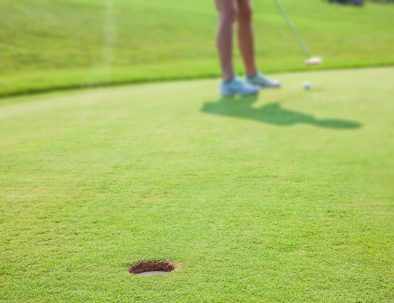 closeup-hole-with-golfer